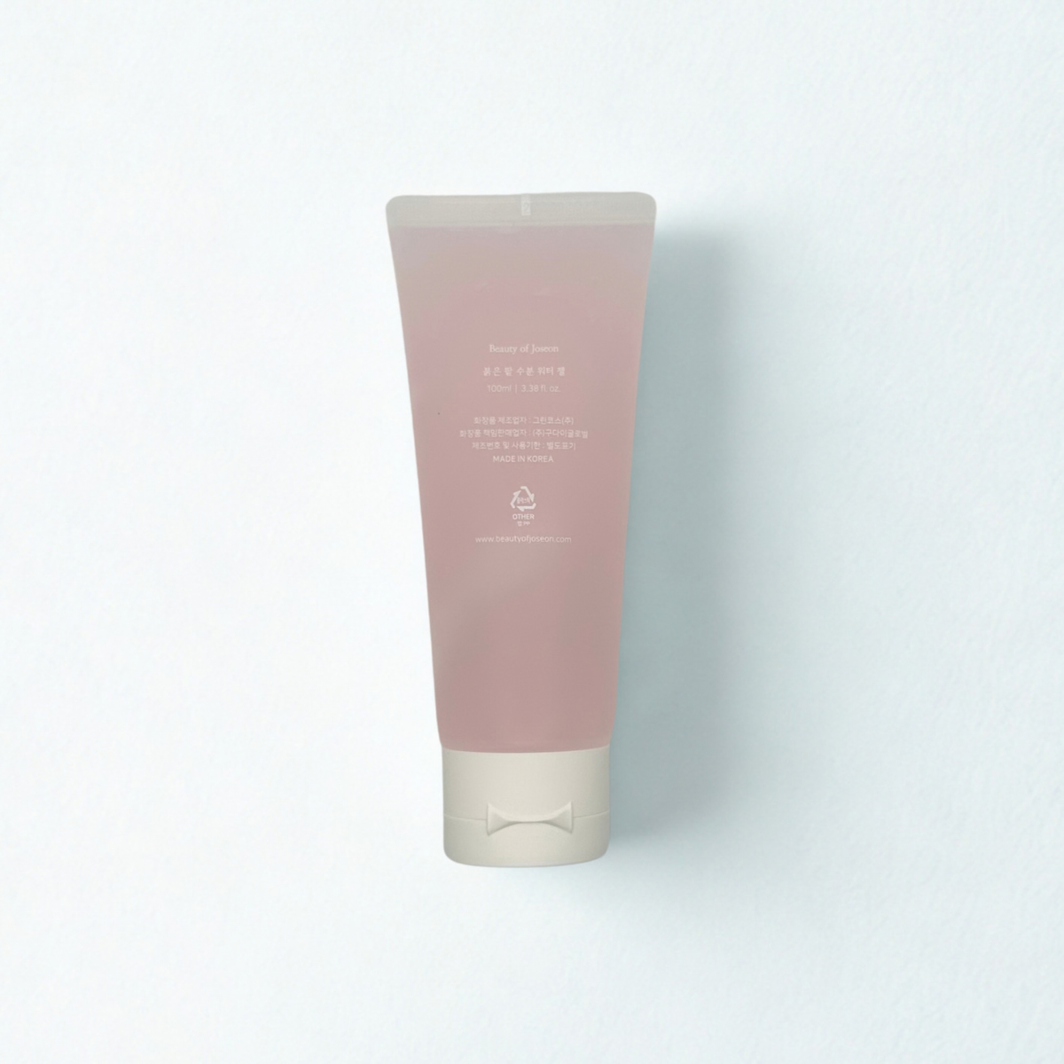 A single tube of Beauty of Joseon Red Bean Water Gel with a soft pink body and a light beige cap, centered against a clean white background.